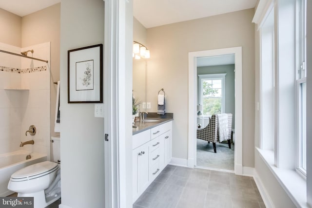 3919 Pineland St, Fairfax, VA 22031 - bathroom with vanity, tile patterned flooring, toilet, baseboards, and  shower combination