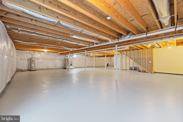 unfinished basement with water heater