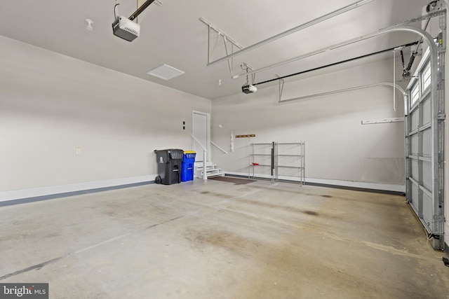 garage featuring a garage door opener