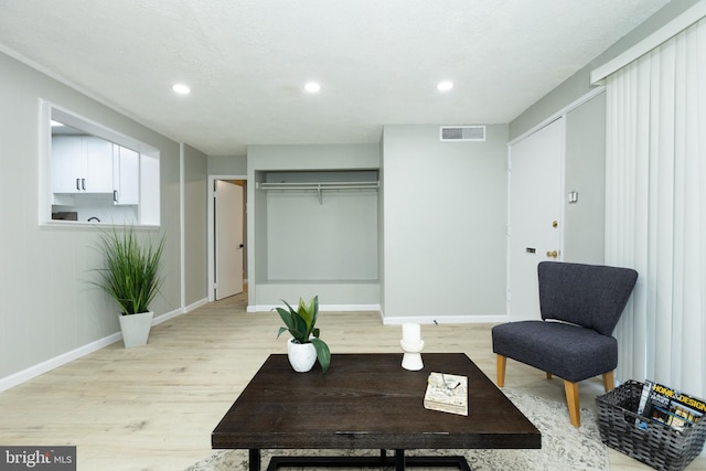 160 Talbott St Unit T5, Rockville, MD 20852 - living room with light wood-style flooring, baseboards, and recessed lighting