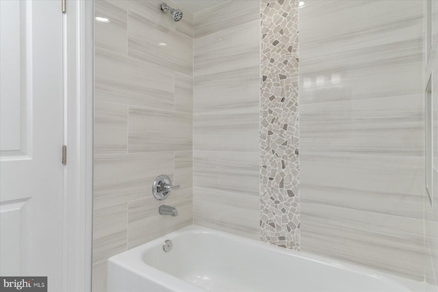 full bath with shower / tub combination