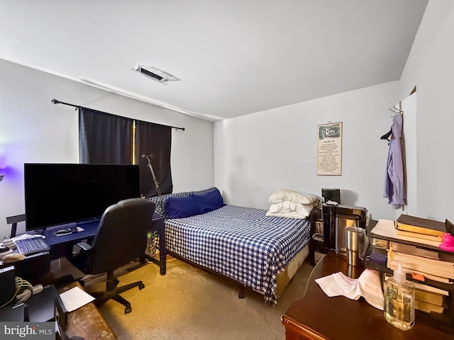 bedroom featuring carpet