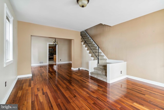 1033 W Rockland St, Philadelphia, PA 19141 - unfurnished living room with wood finished floors, stairs, and baseboards