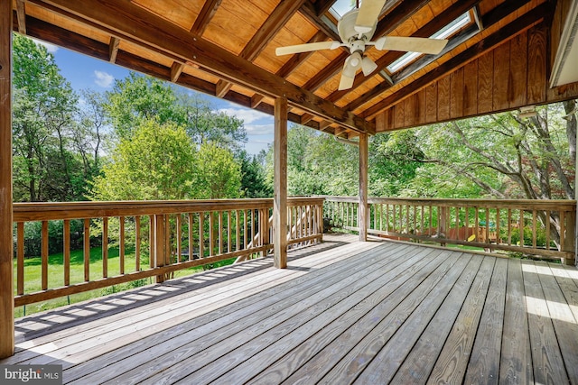 wooden terrace with a ceiling fan