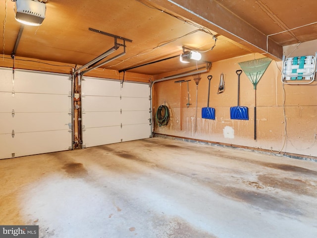 garage featuring a garage door opener