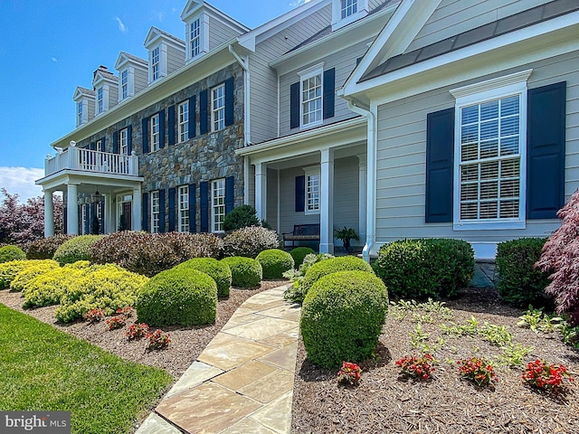 19326 Airwell Ct, Purcellville, VA 20132 - exterior space with covered porch and stone siding