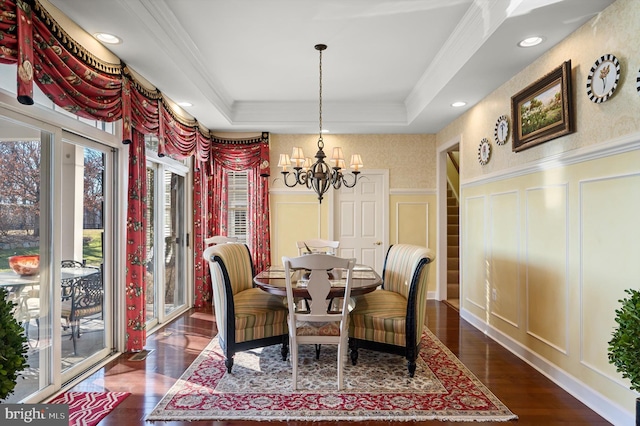 19326 Airwell Ct, Purcellville, VA 20132 - dining room with a decorative wall, dark wood-type flooring, a raised ceiling, a wainscoted wall, and a chandelier