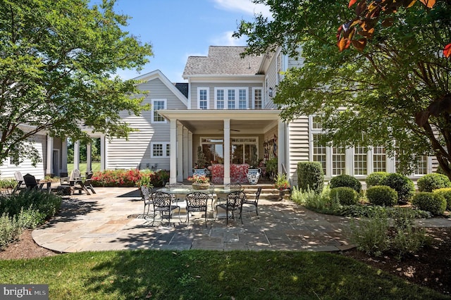 19326 Airwell Ct, Purcellville, VA 20132 - rear view of property featuring roof with shingles, a ceiling fan, a patio, and outdoor dining space