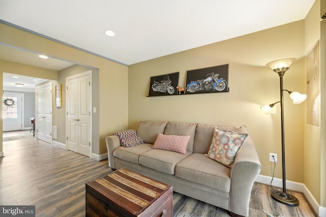 10723 Caledonia Meadow Dr, Manassas, VA 20112 - living room with wood finished floors, baseboards, and recessed lighting