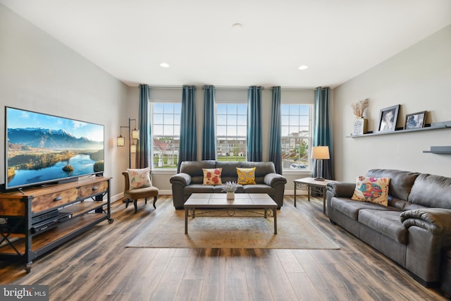 10723 Caledonia Meadow Dr, Manassas, VA 20112 - living room with wood finished floors, recessed lighting, and baseboards