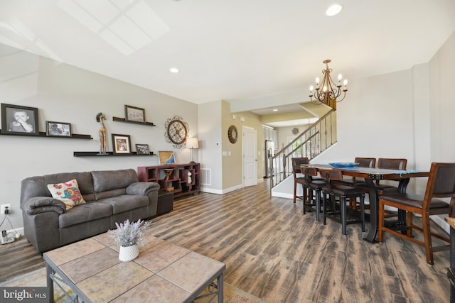 10723 Caledonia Meadow Dr, Manassas, VA 20112 - living room with stairway, dark wood-style floors, baseboards, a chandelier, and recessed lighting