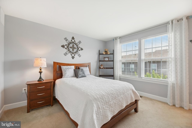 10723 Caledonia Meadow Dr, Manassas, VA 20112 - bedroom featuring light carpet and baseboards