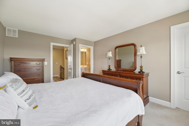 10723 Caledonia Meadow Dr, Manassas, VA 20112 - bedroom with baseboards, carpet flooring, and connected bathroom