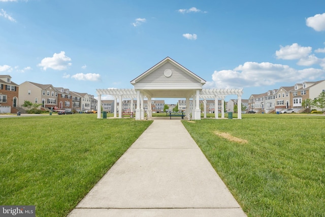 10723 Caledonia Meadow Dr, Manassas, VA 20112 - view of home's community featuring a pergola, a residential view, and a yard