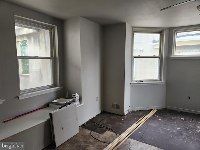 5737 N Park Ave, Philadelphia, PA 19141 - empty room featuring a wealth of natural light, baseboards, and visible vents