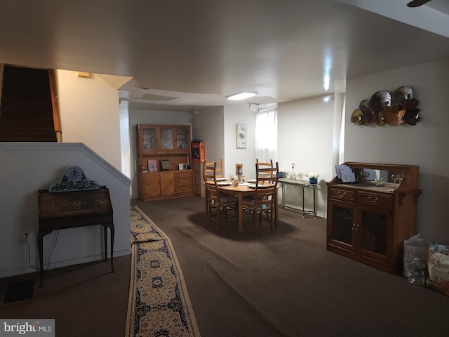 5737 N Park Ave, Philadelphia, PA 19141 - dining area featuring carpet flooring and stairway