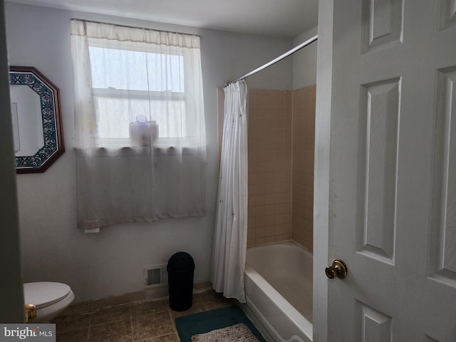 5737 N Park Ave, Philadelphia, PA 19141 - bathroom featuring shower / bath combo with shower curtain, toilet, visible vents, and tile patterned flooring
