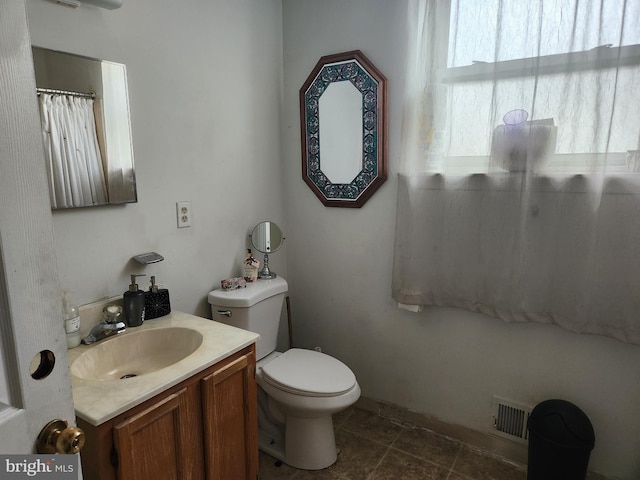 5737 N Park Ave, Philadelphia, PA 19141 - bathroom featuring toilet, visible vents, and vanity