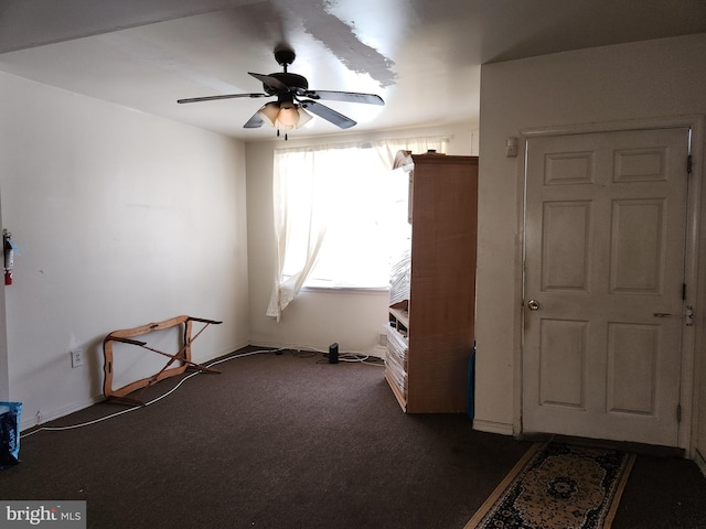 5737 N Park Ave, Philadelphia, PA 19141 - spare room with a ceiling fan and dark carpet