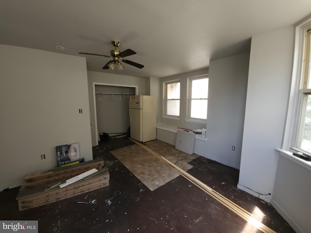 5737 N Park Ave, Philadelphia, PA 19141 - bedroom featuring freestanding refrigerator, a closet, a ceiling fan, and multiple windows