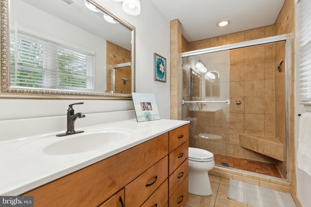 6724 Passageway Pl, Burke, VA 22015 - bathroom with a stall shower, tile patterned flooring, vanity, and toilet
