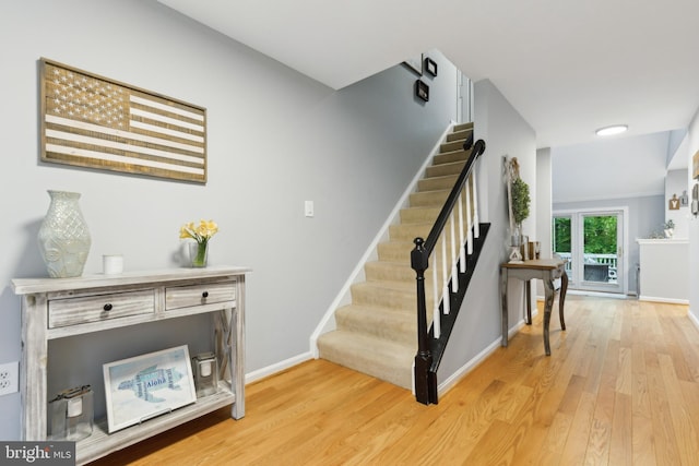 6724 Passageway Pl, Burke, VA 22015 - stairway featuring wood finished floors and baseboards