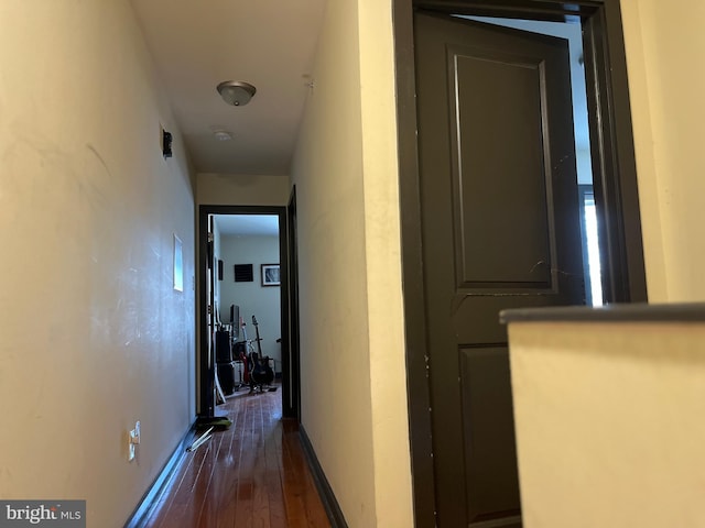 hall with dark wood finished floors