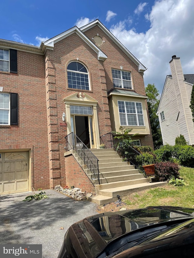 view of front of property with brick siding