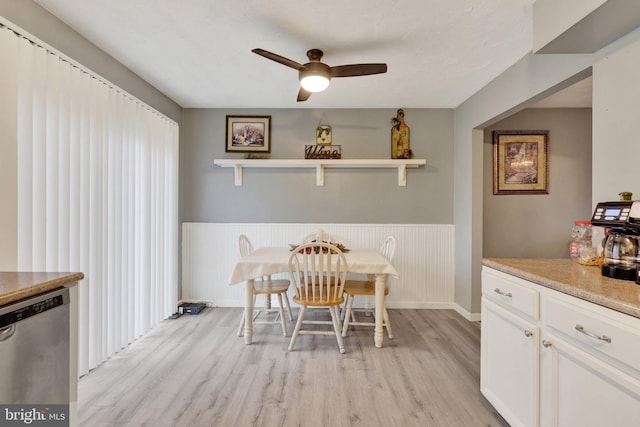 38 Bonniefield Cir, Gettysburg, PA 17325 - dining space with a ceiling fan, light wood finished floors, and a wainscoted wall