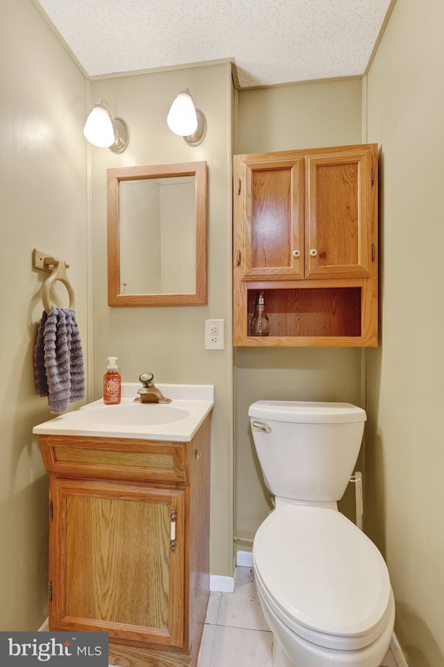 38 Bonniefield Cir, Gettysburg, PA 17325 - half bathroom with vanity, toilet, and tile patterned floors