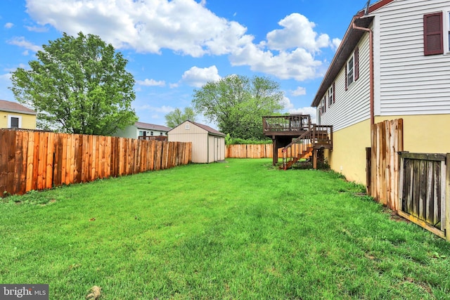 38 Bonniefield Cir, Gettysburg, PA 17325 - view of yard with stairs, a deck, a storage unit, and an outbuilding