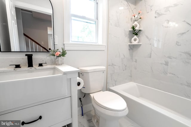 bathroom featuring vanity, toilet, and marble finish floor