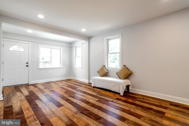 foyer entrance featuring baseboards, recessed lighting, and hardwood / wood-style floors