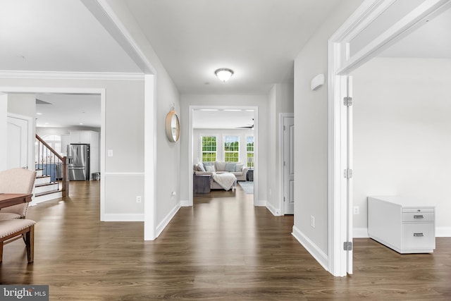 24083 Woodmore Dr, Hollywood, MD 20636 - foyer entrance with baseboards, stairs, and dark wood finished floors