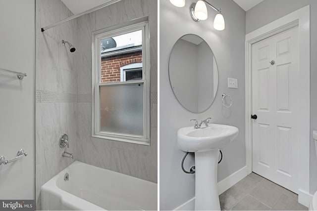 536 Lafayette St, Lancaster, PA 17603 - bathroom featuring tile patterned flooring, washtub / shower combination, baseboards, and a sink