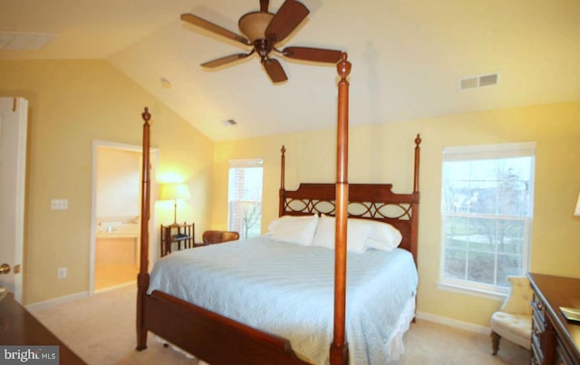 bedroom featuring carpet, visible vents, multiple windows, and lofted ceiling
