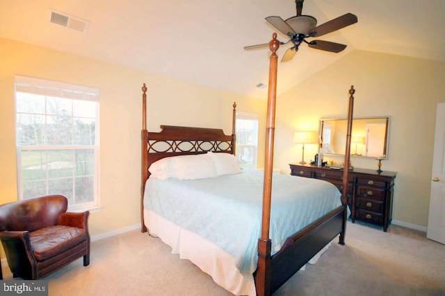 bedroom featuring carpet floors, baseboards, visible vents, and vaulted ceiling