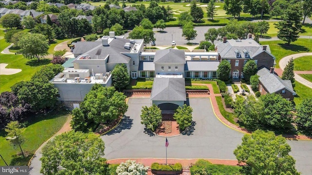 birds eye view of property with a residential view and golf course view