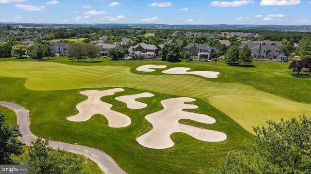view of community featuring a residential view and golf course view