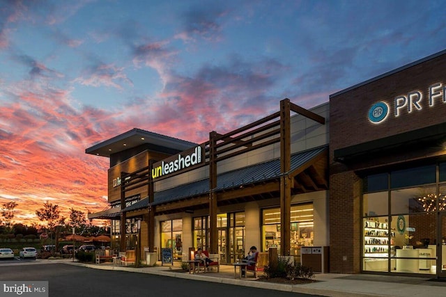 view of property at dusk