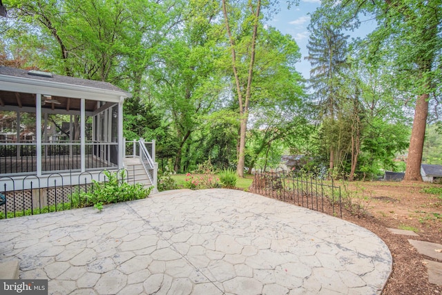 9709 W Bexhill Dr, Kensington, MD 20895 - view of patio with a sunroom