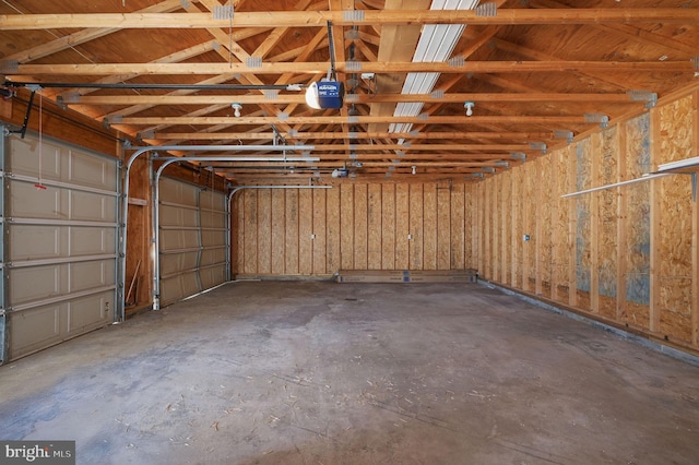 garage featuring a garage door opener