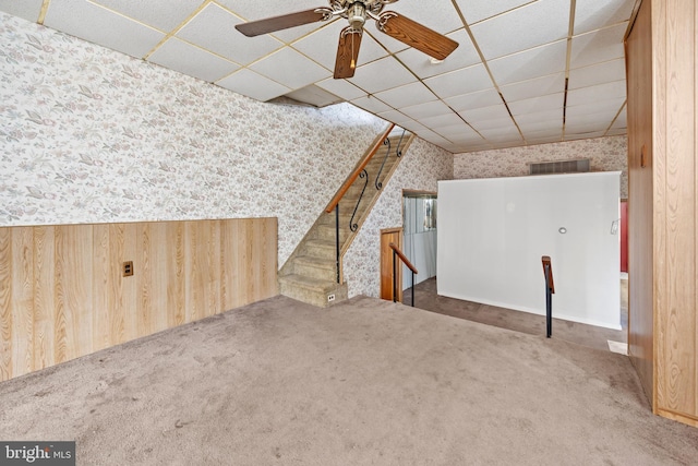 bonus room featuring carpet flooring, a ceiling fan, wallpapered walls, and visible vents