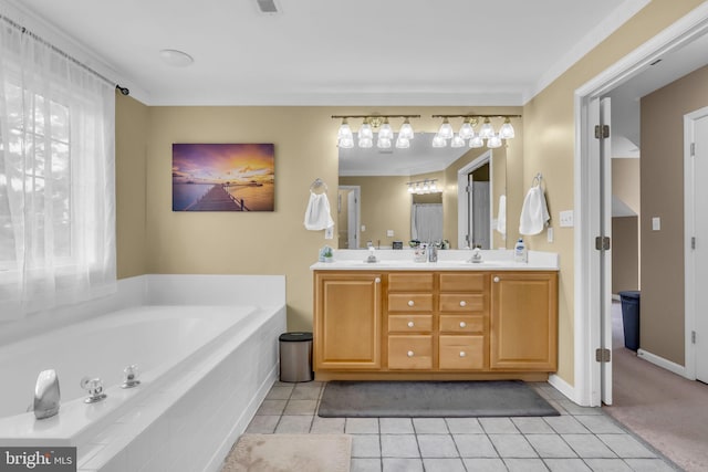 full bath with double vanity, a garden tub, tile patterned flooring, and baseboards