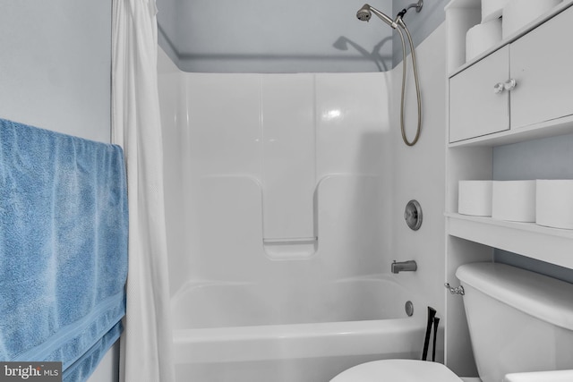 full bath featuring toilet and shower / bath combination with curtain
