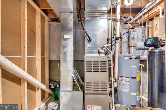 utility room featuring water heater