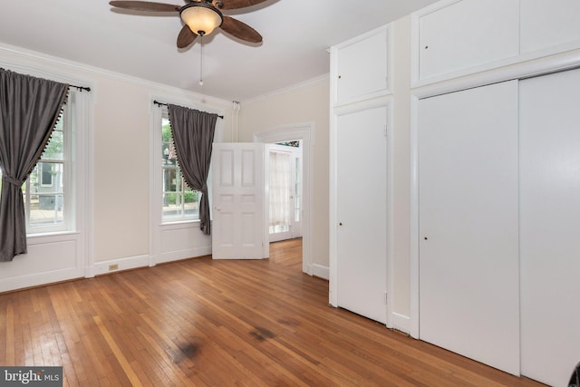 140 Pennsylvania Ave, Westminster, MD 21157 - unfurnished bedroom featuring crown molding, light wood finished floors, and ceiling fan
