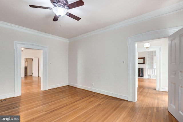 140 Pennsylvania Ave, Westminster, MD 21157 - spare room with crown molding, a ceiling fan, and light wood-type flooring
