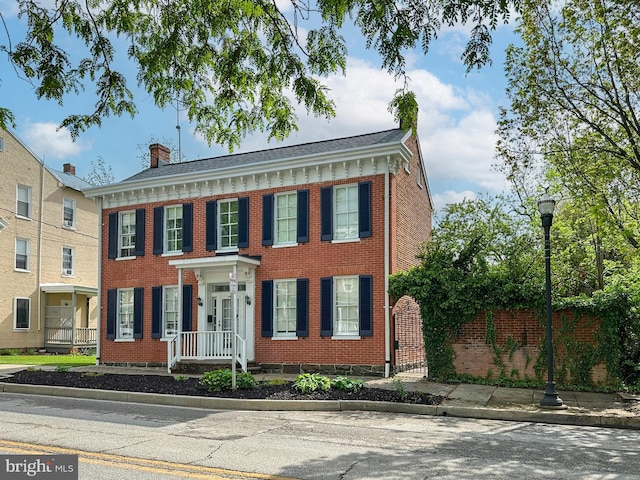 140 Pennsylvania Ave, Westminster, MD 21157 - view of front of home featuring brick siding and a chimney