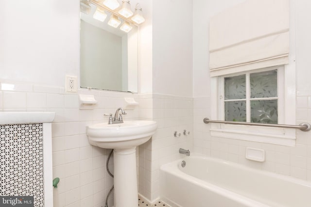 140 Pennsylvania Ave, Westminster, MD 21157 - bathroom with a garden tub, tile walls, and wainscoting